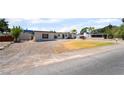 A charming single story home with mature landscaping and an extra garage in the back at 5617 Alfred Dr, Las Vegas, NV 89108
