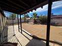 Spacious covered patio and expansive backyard, perfect for outdoor entertaining and relaxation in a private setting at 6402 Agua Dr, Las Vegas, NV 89103