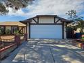 Spacious two-car garage with an automatic door and direct access to the home, offering convenience and security at 6402 Agua Dr, Las Vegas, NV 89103