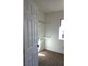 Neat closet with wire shelving for organized storage, white walls, and a window for natural light at 728 Apple Tree Ct, Henderson, NV 89014