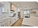 Updated kitchen boasting quartz countertops, modern cabinetry, and stainless steel appliances at 9340 W Washburn Rd, Las Vegas, NV 89149