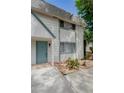 Two-story home featuring neutral-toned walls, a blue door, and green trim at 233 Pecos Way, Las Vegas, NV 89121