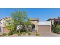 Charming single-Gathering home featuring desert landscaping and a two car garage at 251 Castellari Dr, Las Vegas, NV 89138