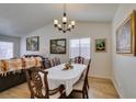 Formal dining room with wood floors, traditional furnishings, and natural light at 368 Umbria Way, Henderson, NV 89014