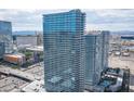 Exterior of a modern high-rise residential building with striking architecture and design at 4471 Dean Martin Dr # 1104, Las Vegas, NV 89103