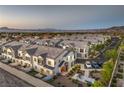 Expansive aerial view of a well-planned community nestled against a mountain backdrop at 545 Thea St # 1315, Henderson, NV 89052