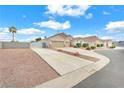 Spacious single-story home with a long driveway and low-maintenance desert landscaping at 5505 Verbena Creek Ct, Las Vegas, NV 89131