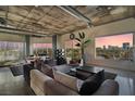 Open-concept living space with city views, modern furnishings, and industrial style accents at 900 Las Vegas Blvd # 912, Las Vegas, NV 89101