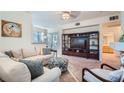 A bright living room featuring plush seating and modern entertainment center at 9050 Warm Springs Rd # 2050, Las Vegas, NV 89148