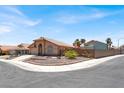 Well-maintained single-story home featuring desert landscaping, adding to its curb appeal at 1613 Glenrosa Dr, North Las Vegas, NV 89031