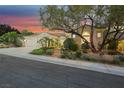 Attractive one-story home with well-maintained landscaping and a large shade tree at 1805 Prichard Ave, Henderson, NV 89052