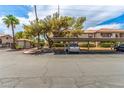 Condo complex with assigned covered parking and well maintained landscaping at 2606 Durango Dr # 181, Las Vegas, NV 89117