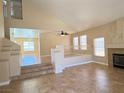 Spacious living room featuring tile flooring, fireplace, and plenty of natural light at 3679 Funston Way, Las Vegas, NV 89129
