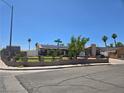 Charming single story home featuring desert landscaping, corner lot, and solar panels at 4823 El Tesoro Ave, Las Vegas, NV 89121