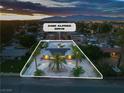 An aerial view of a single-story house, highlighting the roof-mounted solar panels at 5486 Alfred Dr, Las Vegas, NV 89108