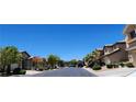 Picturesque street view showcasing well-maintained homes and lush landscaping at 7395 Howell Mill Ct, Las Vegas, NV 89113