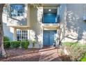Charming two-story townhome featuring a private balcony and well-maintained landscaping at 882 Tam O Shanter, Las Vegas, NV 89109