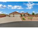 Single story home featuring desert landscaping, driveway and two-car garage at 9180 Mohawk St, Las Vegas, NV 89139