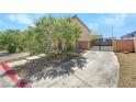 Long driveway with secured gate leading to the charming home at 10343 Beallsville St, Las Vegas, NV 89141