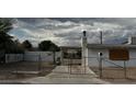 Picture of a front yard and partial view of a single-story home with a chimney at 2645 Cedar Ave, Las Vegas, NV 89101