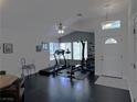 Versatile living space with hardwood floors, neutral paint, and ample room for a home gym at 4420 Loma Ct, Las Vegas, NV 89130