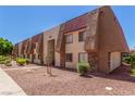 Attractive multi-Gathering residential exterior featuring a stone facade and well-maintained landscaping at 5301 River Glen Dr # 205, Las Vegas, NV 89103