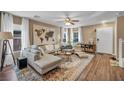 Spacious living room featuring a comfortable sectional sofa and modern decor at 582 Brompton St, Las Vegas, NV 89178
