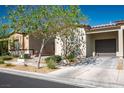 Charming single-story home featuring a desert-landscaped front yard with a single-car garage at 7472 Brody Meadows St, North Las Vegas, NV 89084