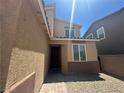 Charming exterior view of home featuring a well-maintained facade and clean landscaping at 7636 Bandon Cliffs St, North Las Vegas, NV 89084