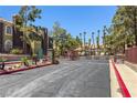 Gated entrance to the Rain Tree West condo community, offering security and curb appeal at 7950 W Flamingo Rd # 1024, Las Vegas, NV 89147