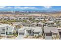 Gorgeous aerial showcasing a modern home in a community setting with city views at 818 Calluna St, Las Vegas, NV 89138