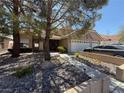 Charming single-story home featuring a two-car garage and desert landscaping at , Las Vegas, NV 89145