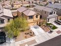 This home offers an aerial view of the property showcasing the landscaping and neighborhood at 1012 Water Cove St, Henderson, NV 89011