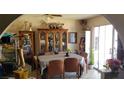 Casual dining area with a table set for six, adjacent to a sliding glass door at 1886 Ludington Ave, Las Vegas, NV 89156