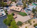A bird's eye view of the home's lush backyard, complete with a covered patio at 2821 Moon Cir, Las Vegas, NV 89120