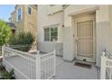 Cozy front porch with a secure metal door and a welcoming 