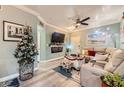 Inviting living room with a cozy sofa, decorative fireplace, and stylish furnishings under a bright ceiling at 830 Carnegie St # 512, Henderson, NV 89052