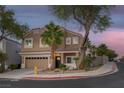 Beautiful two-story home with desert landscaping and a two-car garage on a well-manicured lot at 1246 Diamond Valley St, Henderson, NV 89052