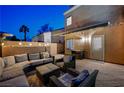 Cozy outdoor patio area with comfortable seating, ideal for entertaining and relaxing at 1968 Evening Glow Dr, Las Vegas, NV 89134