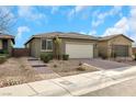 Charming single-story home with low-maintenance desert landscaping and paved driveway at 2261 Cold Canyon Ave, North Las Vegas, NV 89086