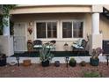 Ground level condo patio with seating and desert landscaping, plus easy access to the entrance at 7450 S Eastern Ave # 1012, Las Vegas, NV 89123