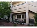 Ground level condo patio with seating and desert landscaping, plus easy access to the entrance at 7450 S Eastern Ave # 1012, Las Vegas, NV 89123