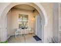 Cozy patio with seating area and security screen door at 9975 Peace Way # 1024, Las Vegas, NV 89147