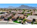 Charming single story home featuring well manicured landscaping and an attached garage nestled in a vibrant community at 2605 Orchid Valley Dr, Las Vegas, NV 89134