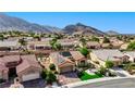 Charming single story home featuring well manicured landscaping and an attached garage nestled in a vibrant community at 2605 Orchid Valley Dr, Las Vegas, NV 89134
