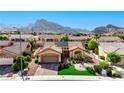Charming single story home featuring well manicured landscaping and an attached garage nestled in a vibrant community at 2605 Orchid Valley Dr, Las Vegas, NV 89134