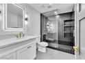 Modern bathroom with a glass-enclosed shower, sleek vanity, and stylish fixtures at 3189 Montecito Dr, Las Vegas, NV 89120