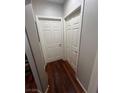 Hallway featuring wood floors and neutral paint at 3975 N Hualapai Way # 246, Las Vegas, NV 89129