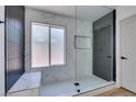 Sleek bathroom with a glass-enclosed shower, marble accents, and modern fixtures for a spa-like feel at 6126 Bedrock Ct, North Las Vegas, NV 89031