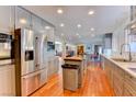 Open kitchen design with long granite countertops and stainless steel appliances at 1818 Waldman Ave, Las Vegas, NV 89102